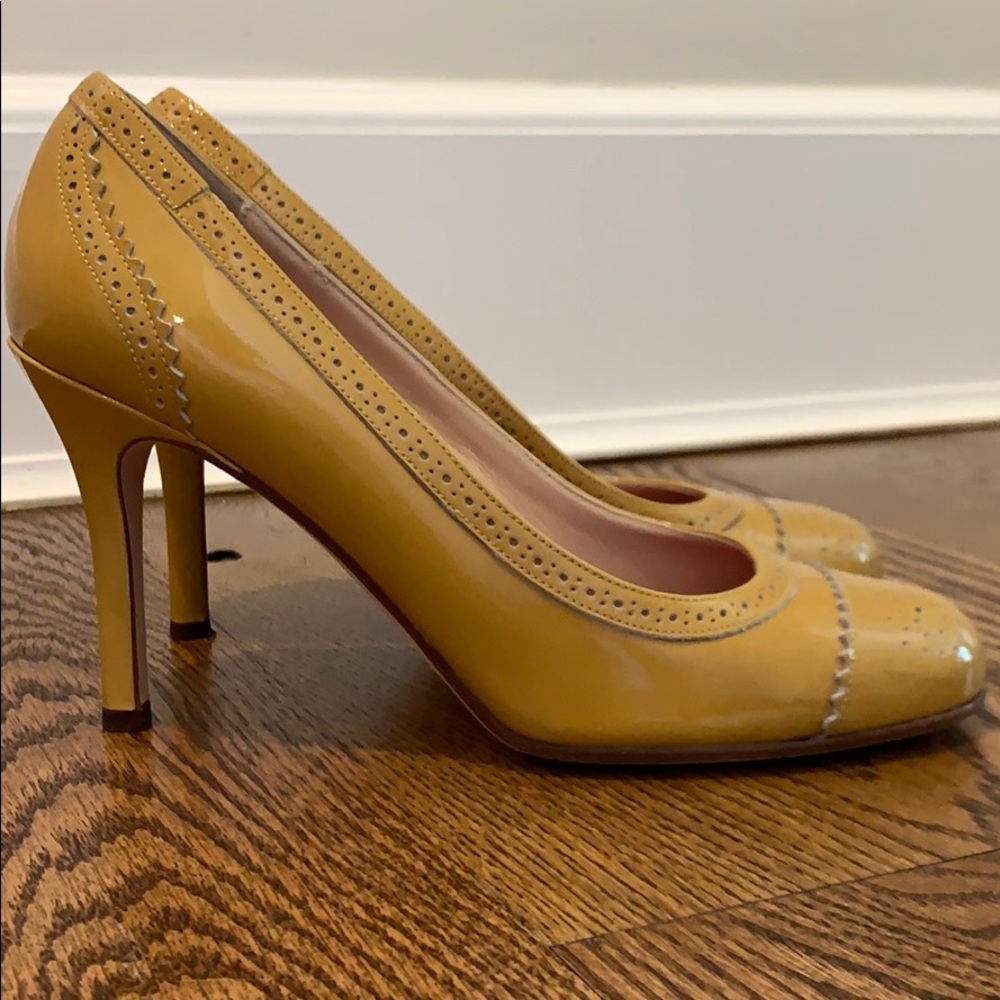Kate Spade pumps, butterscotch, size 8.